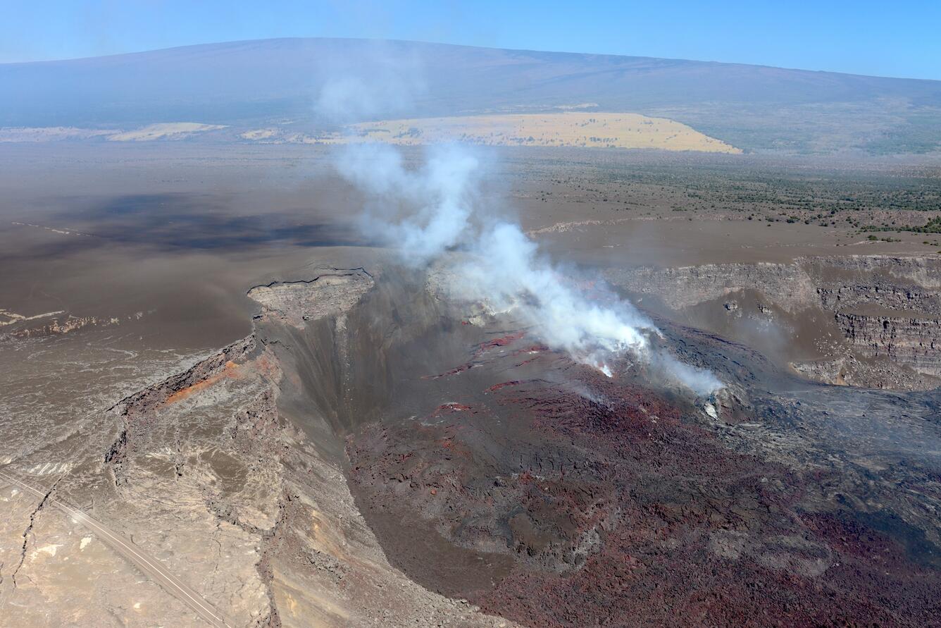 Color photograph of volcanic eruptive vents in crater