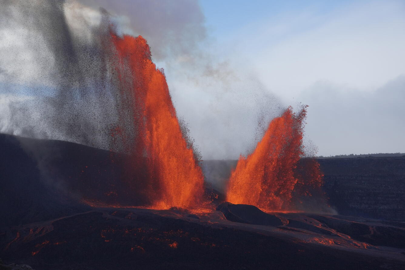 Color photograph of dual lava fountains