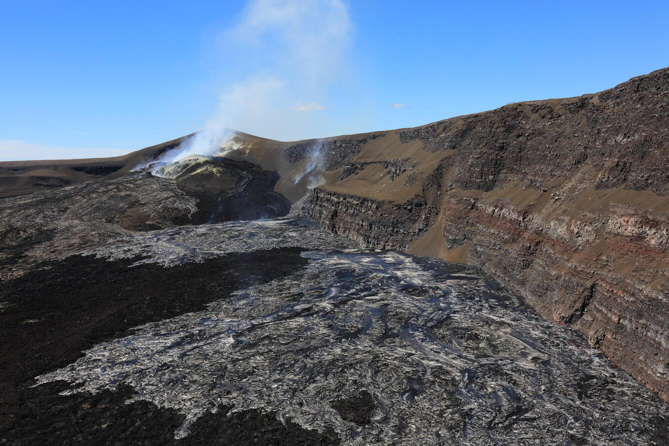 Color photograph of volcanic vents and crater wall