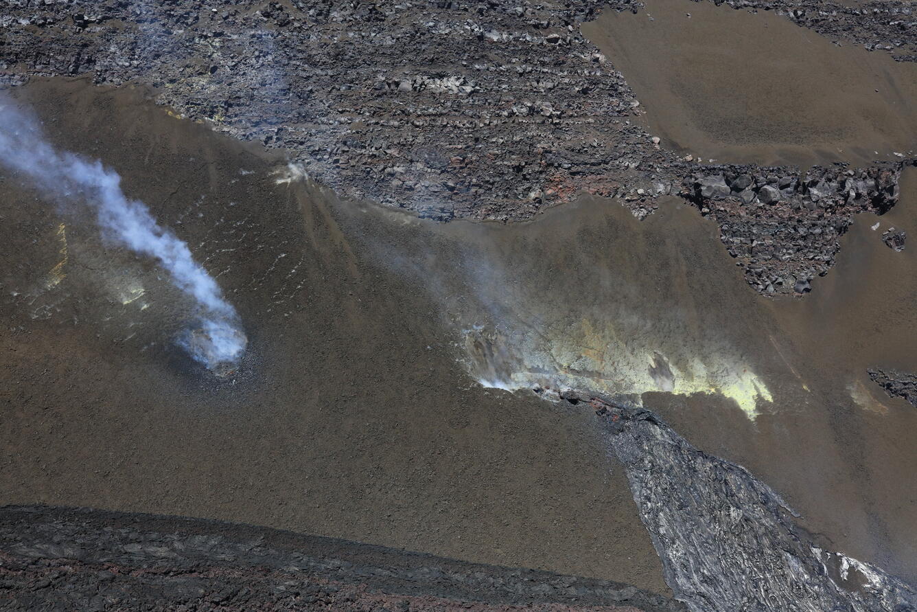 Color photograph of volcanic vents in crater wall