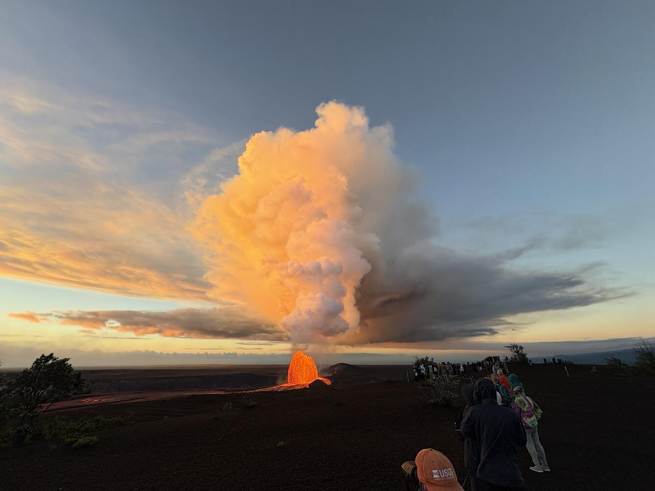 Color photograph of lava fountain and eruptive plume