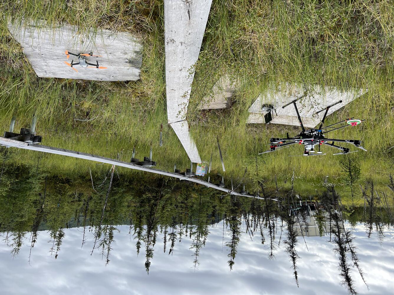 Matrice 600 UAS carrying the methane sensor (left) and Mavic Pro UAS used to collect videos and photos