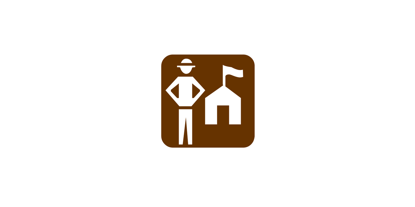 Ranger and building on top of a brown background.