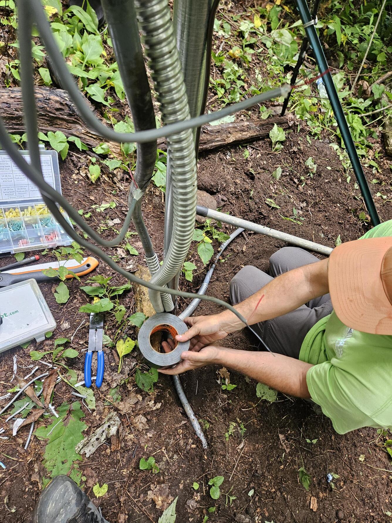 Hydrologic Technicians repair landslide monitoring site in Shumont Mountain, NC