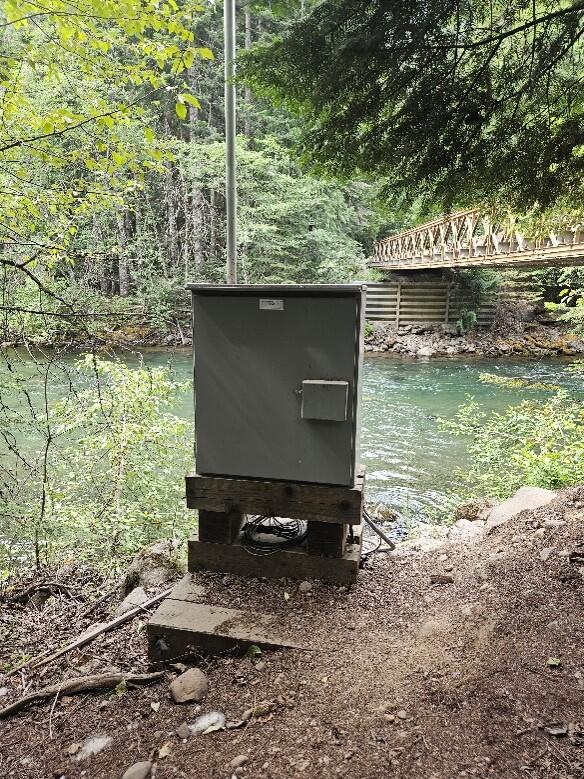 Metal box on side of river