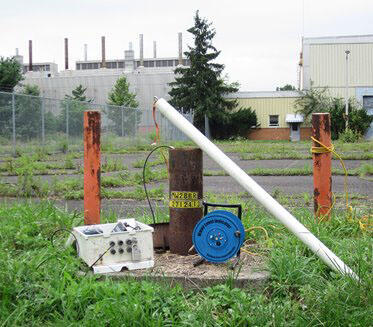 Equipment used to perform a slug test on a groundwater well.