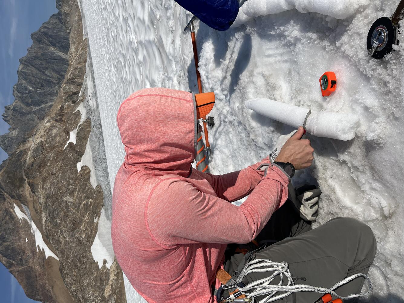 USGS scientist examines a snow core 
