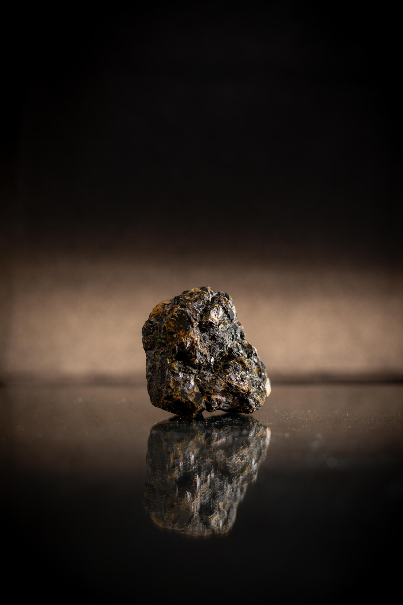 High-definition image of sphalerite specimen with dark coloration and crystal structure.