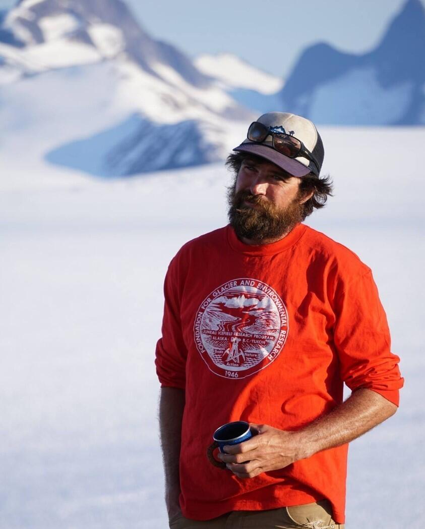 Photo of USGS scientist on a glacier. 