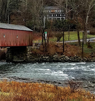 Right side of image: Surveying a bridge in Connecticut