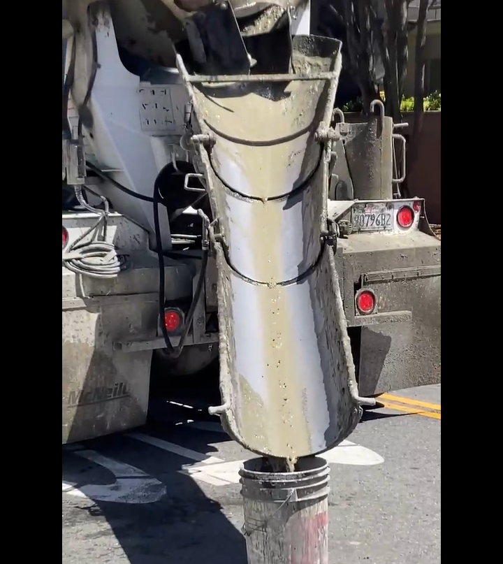 grey thick liquid coming out of a slide