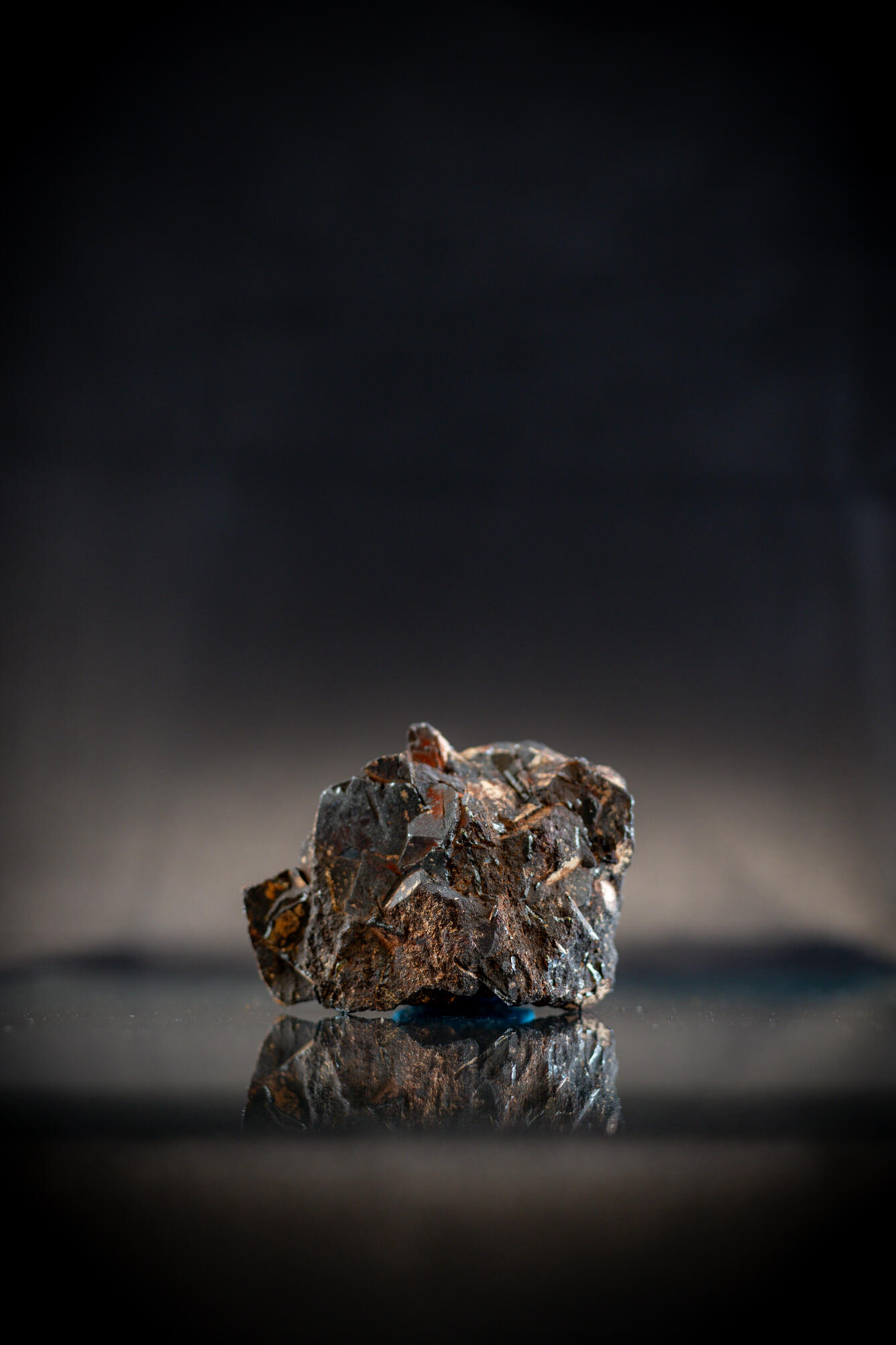 High-definition image of wolframite specimen with fine-grained texture and dark luster.