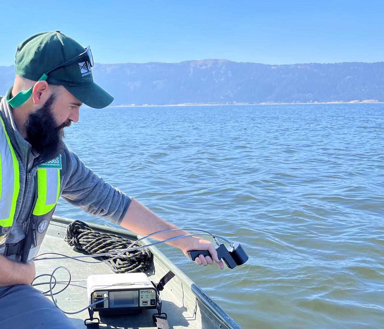 USGS using spectral radiometer from boat in Lake Cascade, Idaho 