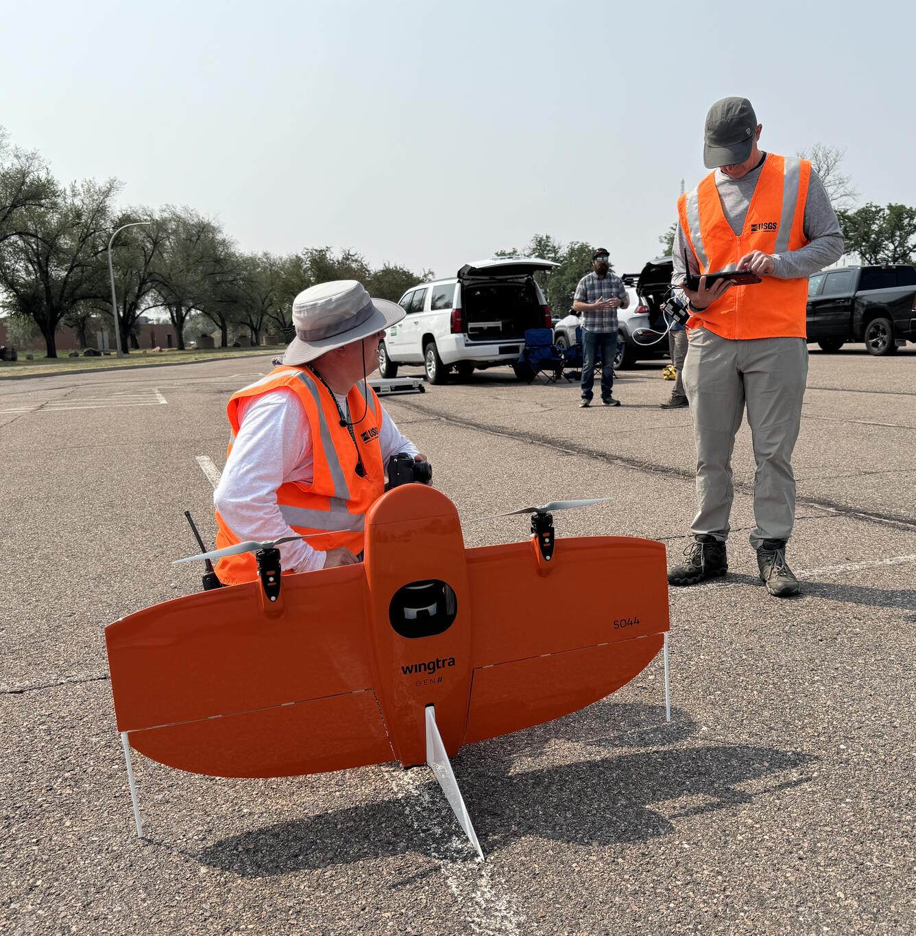 NUSO researchers prepare for evaluation flights with a vertical take-off and landing UAS