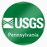 Green circle with white letters U S G S and wavy logo