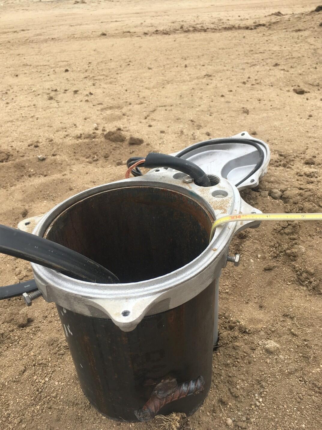 Groundwater well with electric water-level tape