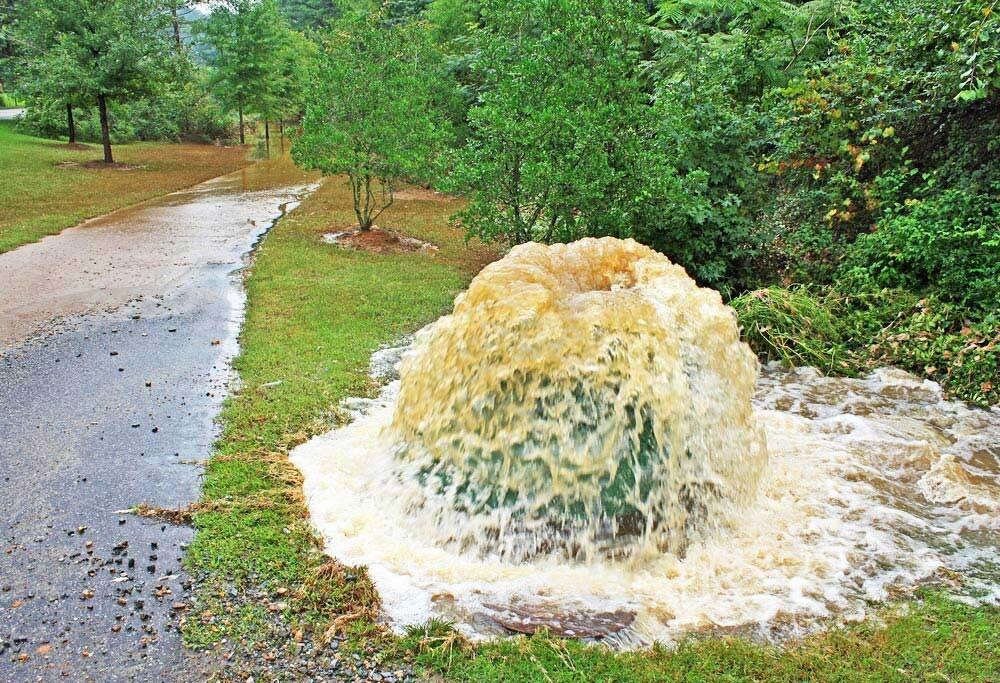 Image: Heavy rains cause a sewage overflow.