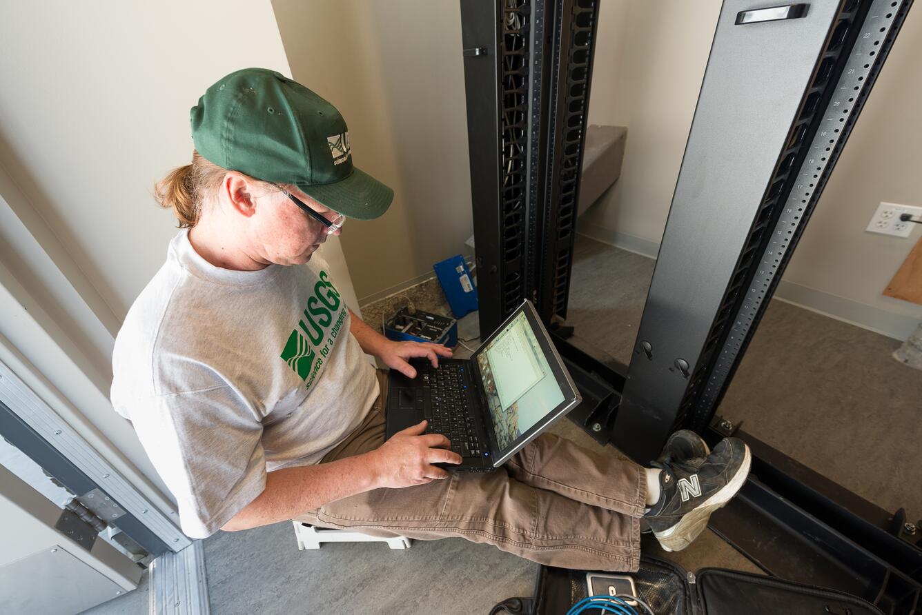 Image: USGS Scientist Installing Seismograph