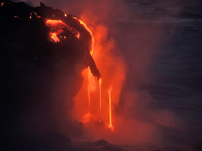 This is a photo of lava falling into water off point of western delta.