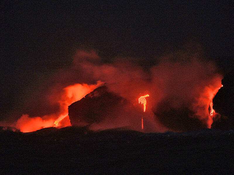 This is a photo of lava entering water off point of eastern Banana delta.