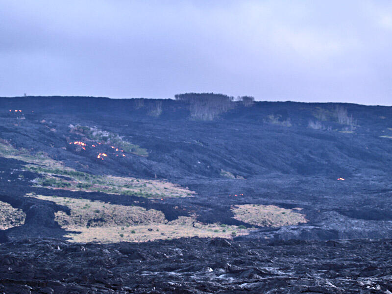 This is a photo of incandescent surface lava along track of Banana flow.