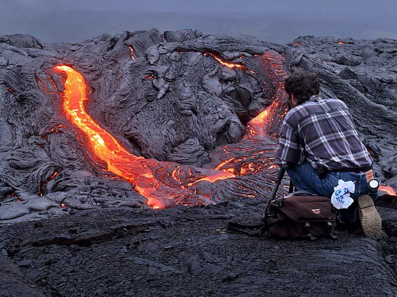 This is a photo of two streams of lava spilling from growing tumulus near front of inflating Banana flow.