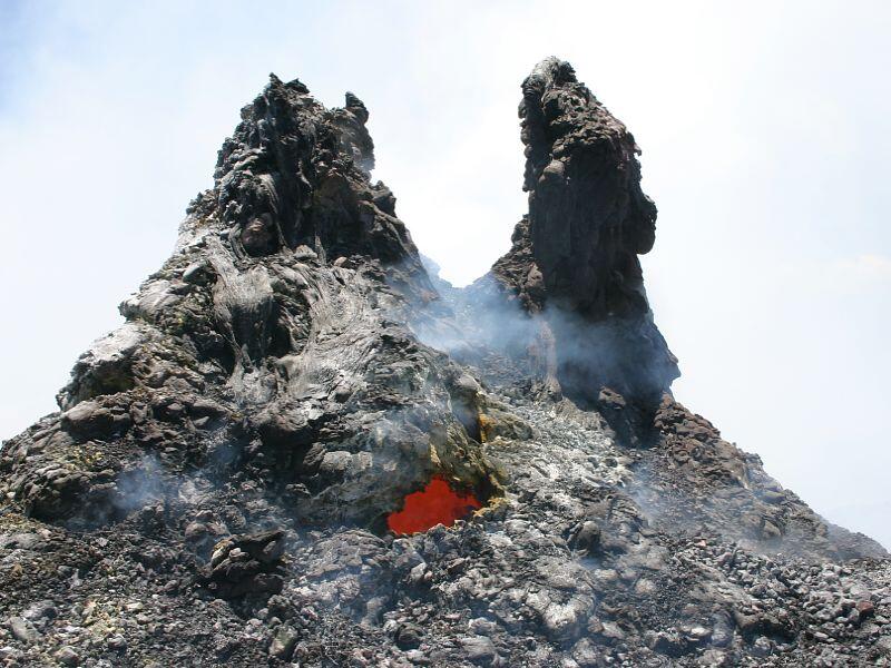 This is a photo of bright incandescence of Cookie Monster hornito above Mother's Day lava tube.