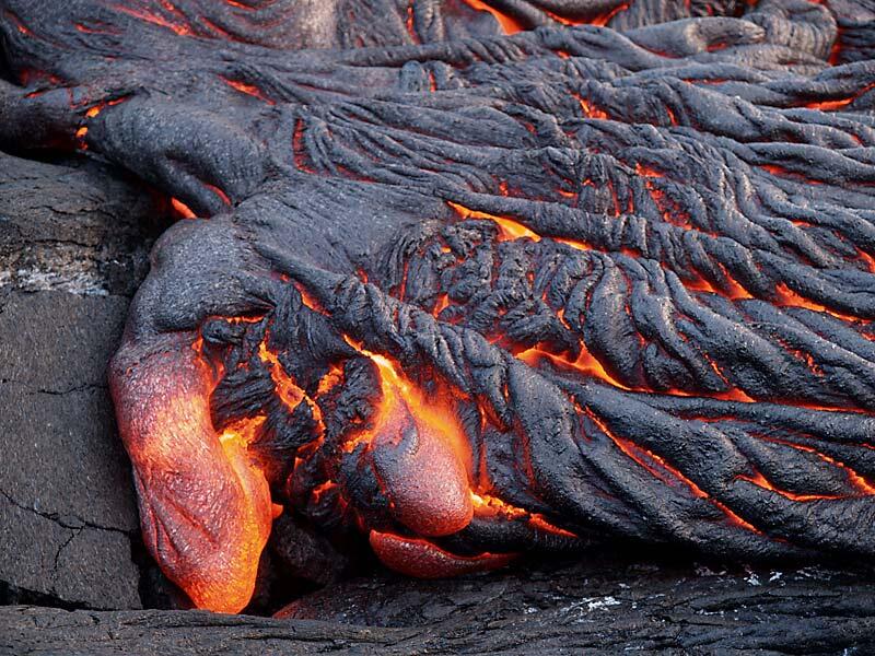 This is a photo of a toe pushing through crust.