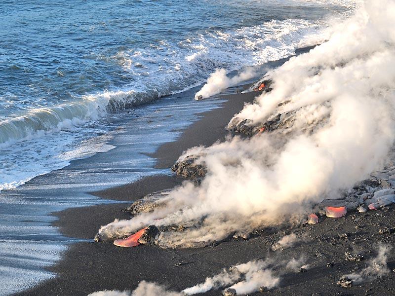 This is a photo of small delta forming as lava as it extends to shoreline.