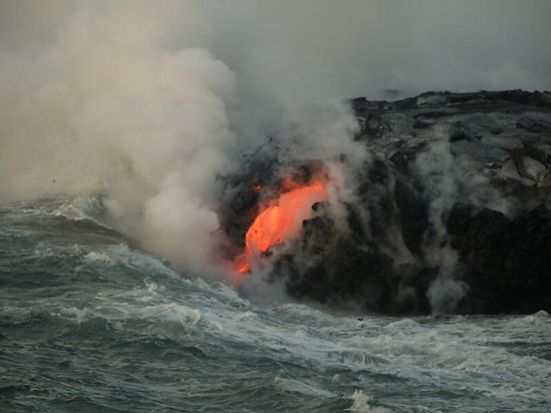 This is a photo of a stream of lava pouring into Pacific near point of eastern Banana delta.