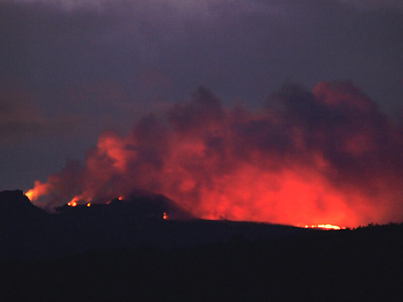 This is a photo of bright glow above lava flow south of Pu`u `O`o.