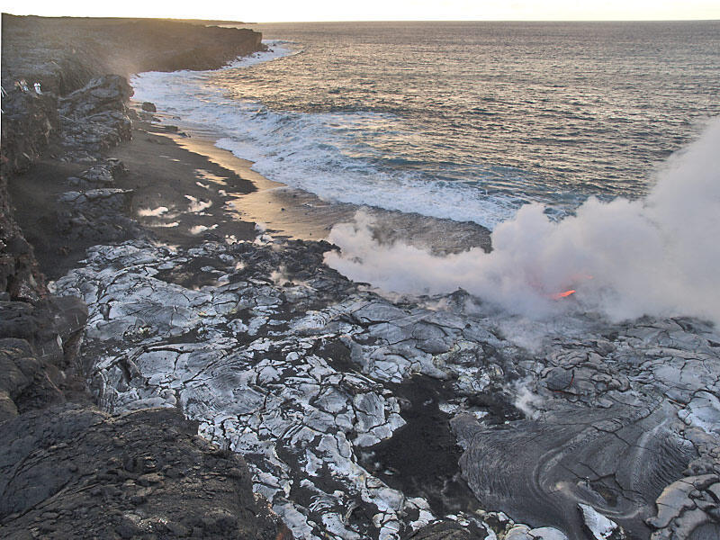 This is a photo of growing lava delta and black sand beach.