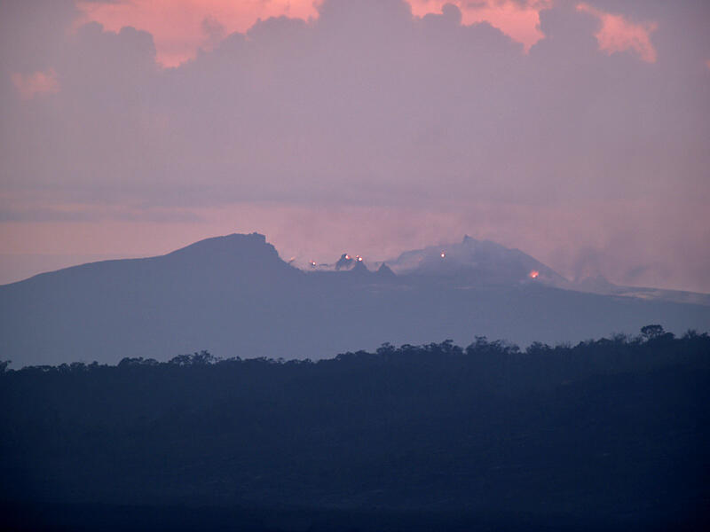 This is a photo of a postdawn view of Pu`u `O`o from top of Pu`u Huluhulu.