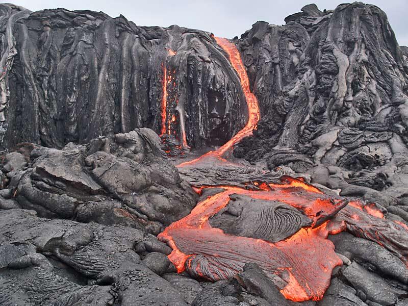 This is a photo of cascades of lava in western prong of Banana flow descending an old sea cliff.