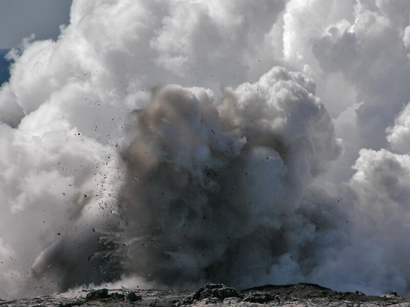 This is a photo of a littoral explosion from one of entry points at apex of East Lae`apuki lava delta.