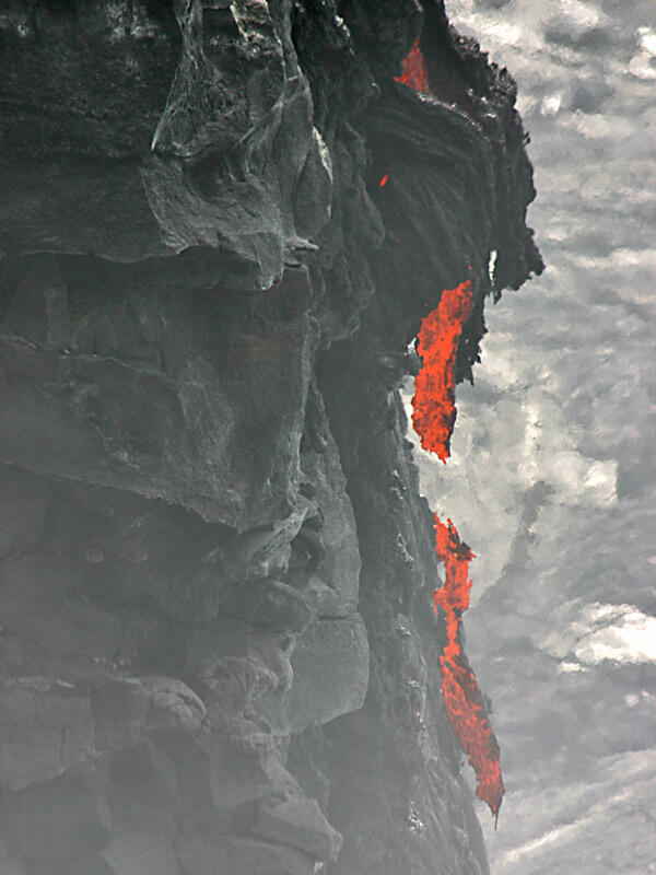 This is a photo of lava falls breaking apart and dropping into the water, front of delta at Kamoamoa.