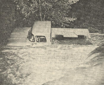 large log flowing down Rapid Creek 1962