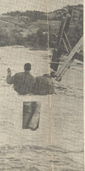Electrical workers over Bear Butte Creek on July 14, 1962