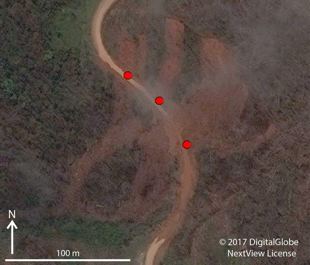 Excerpt of satellite image showing landslide impacts to a road in the southeast corner of Las Marias Municipality.