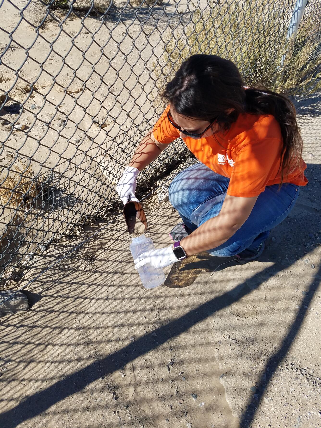 USGS scientist collecting soil samples at the Silver State Solar South Project