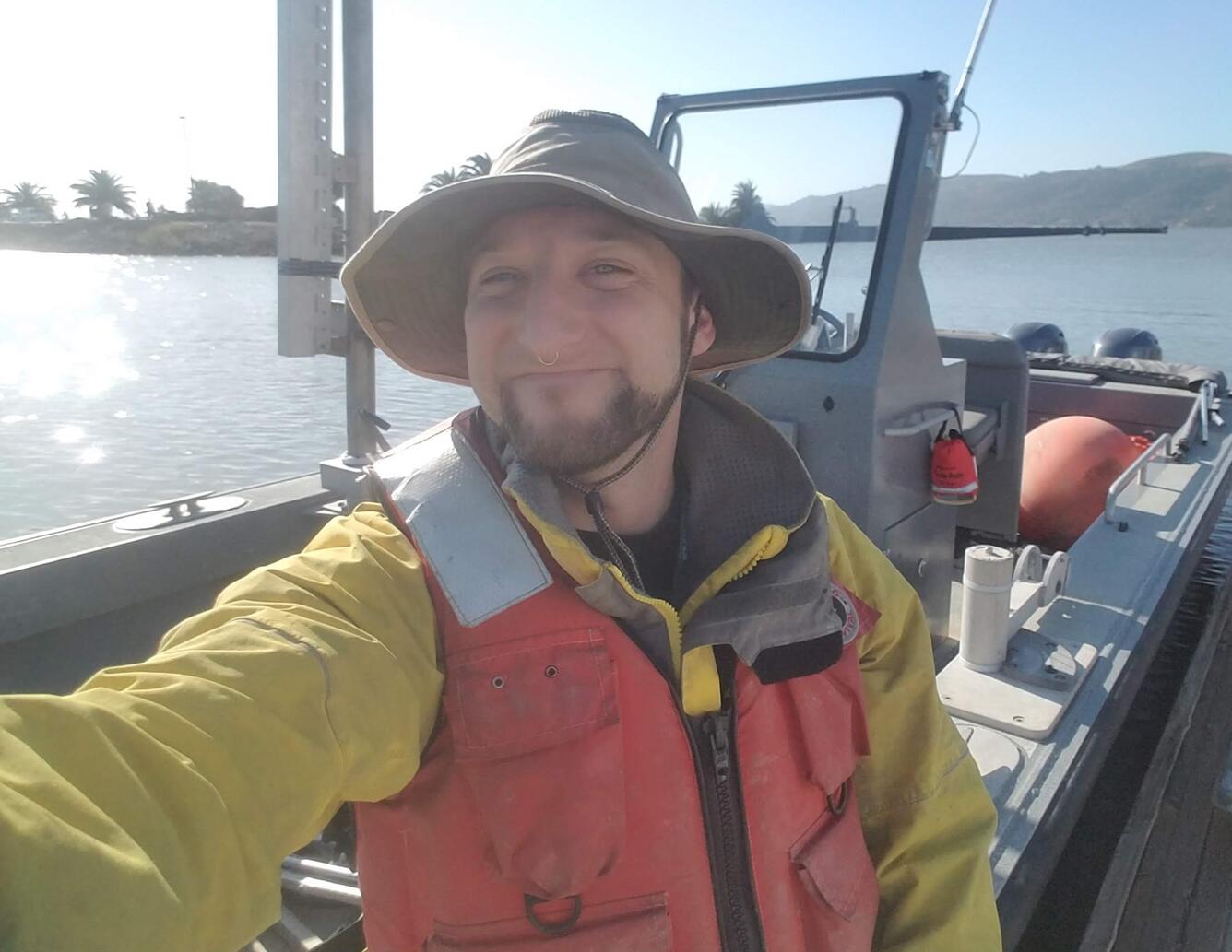 Photo of David Hart on a U.S.G.S. boat