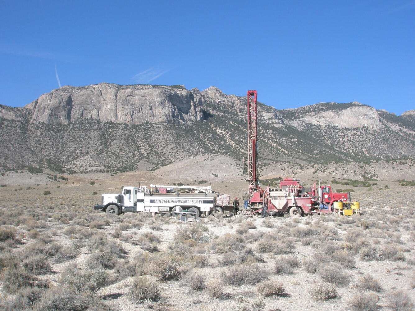 Drill equipment with a mountain in the background