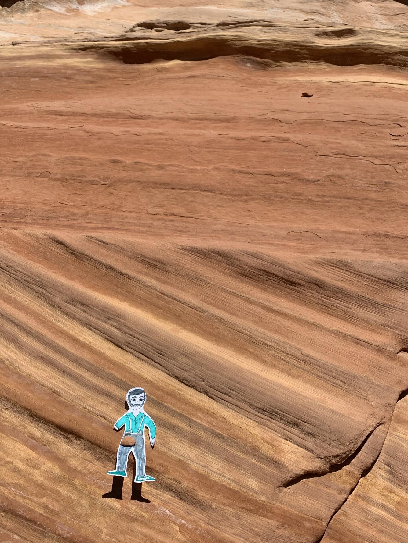 Paper Powell visits ancient sand dune deposits in Capitol Reef National Park in Utah