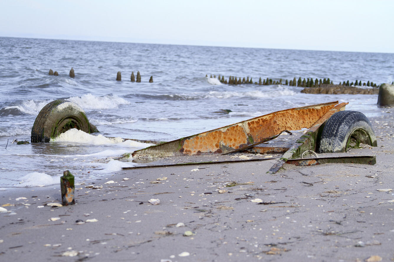 Pieces of abandoned mobile home on Tangier Island, VA. Land has been lost from erosion, sea-level rise, and subsidence.