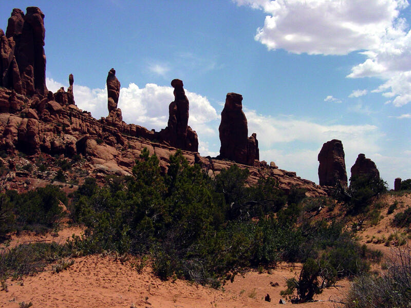 View of multiple tower shaped rocks on a slight angle