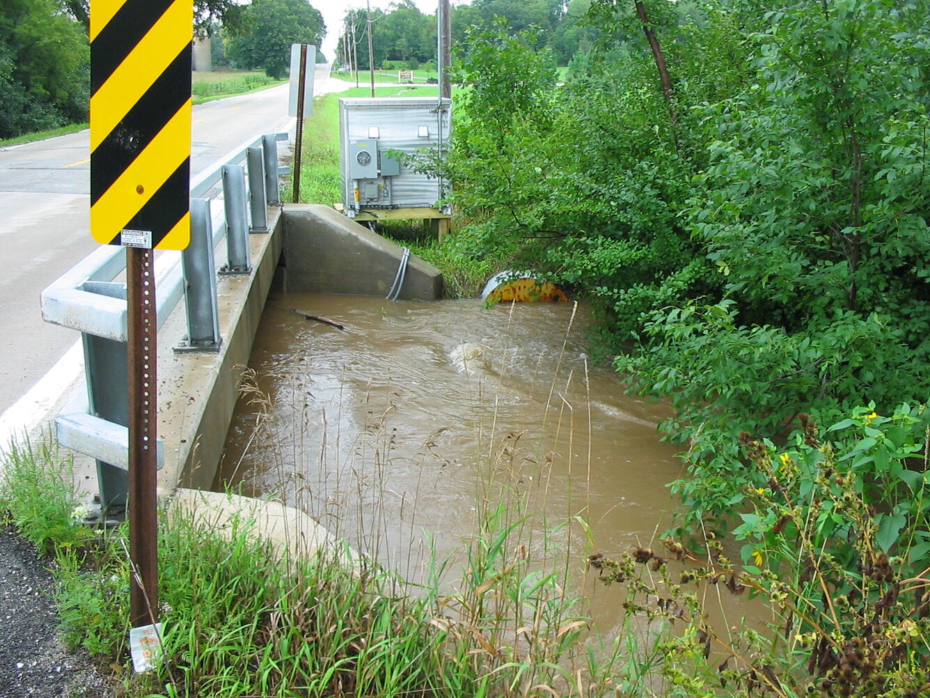 Stream gage house at Little Menomonee River near Freistadt during high water