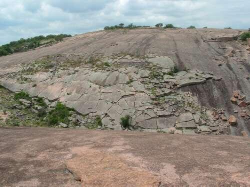 Enchanted Rock is a granite formation from the Precambrian age.
