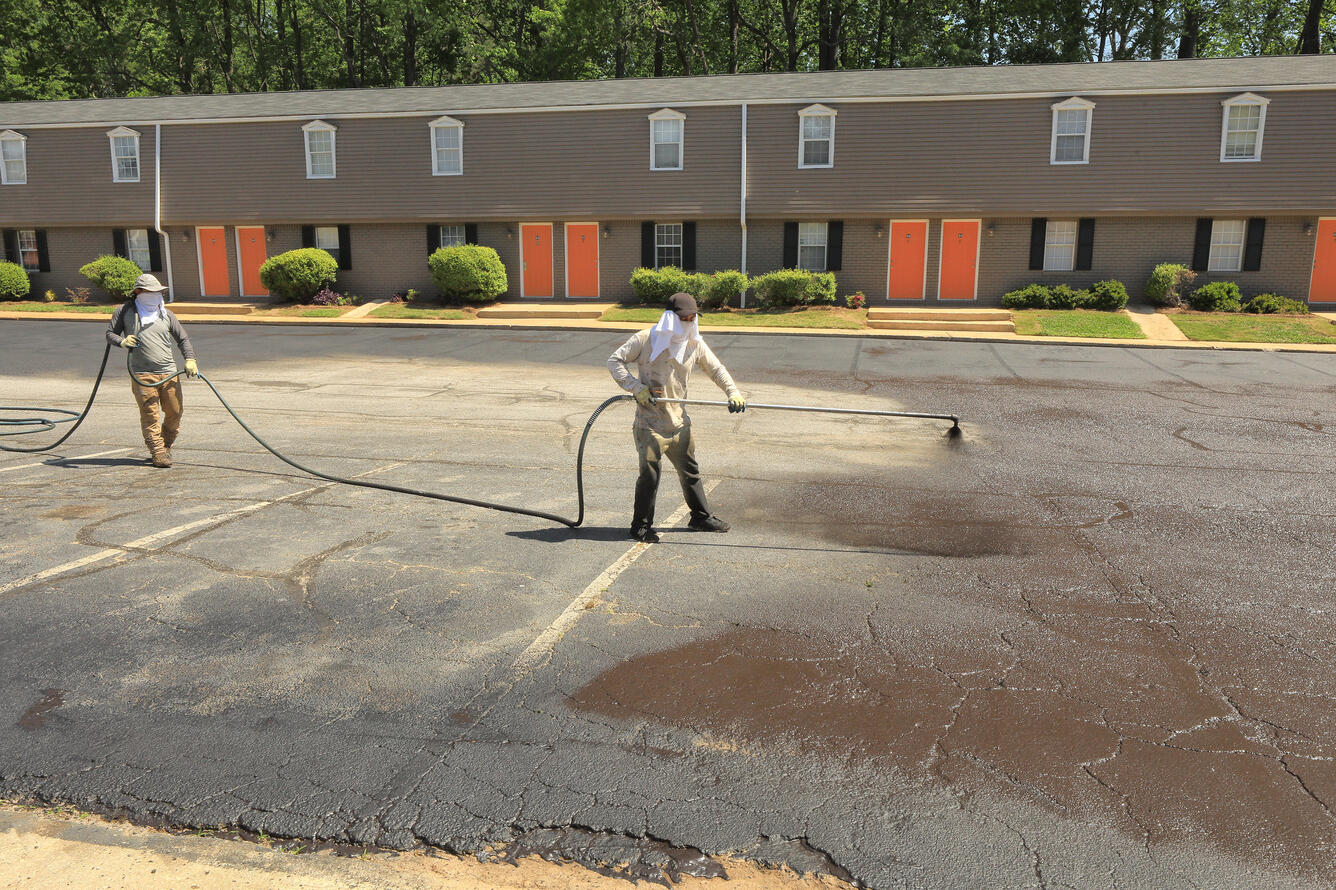 Sealcoat application at an apartment complex in Georgia
