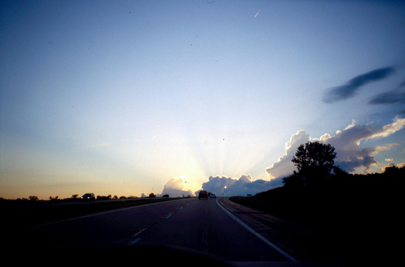 Picture of a road with setting sun