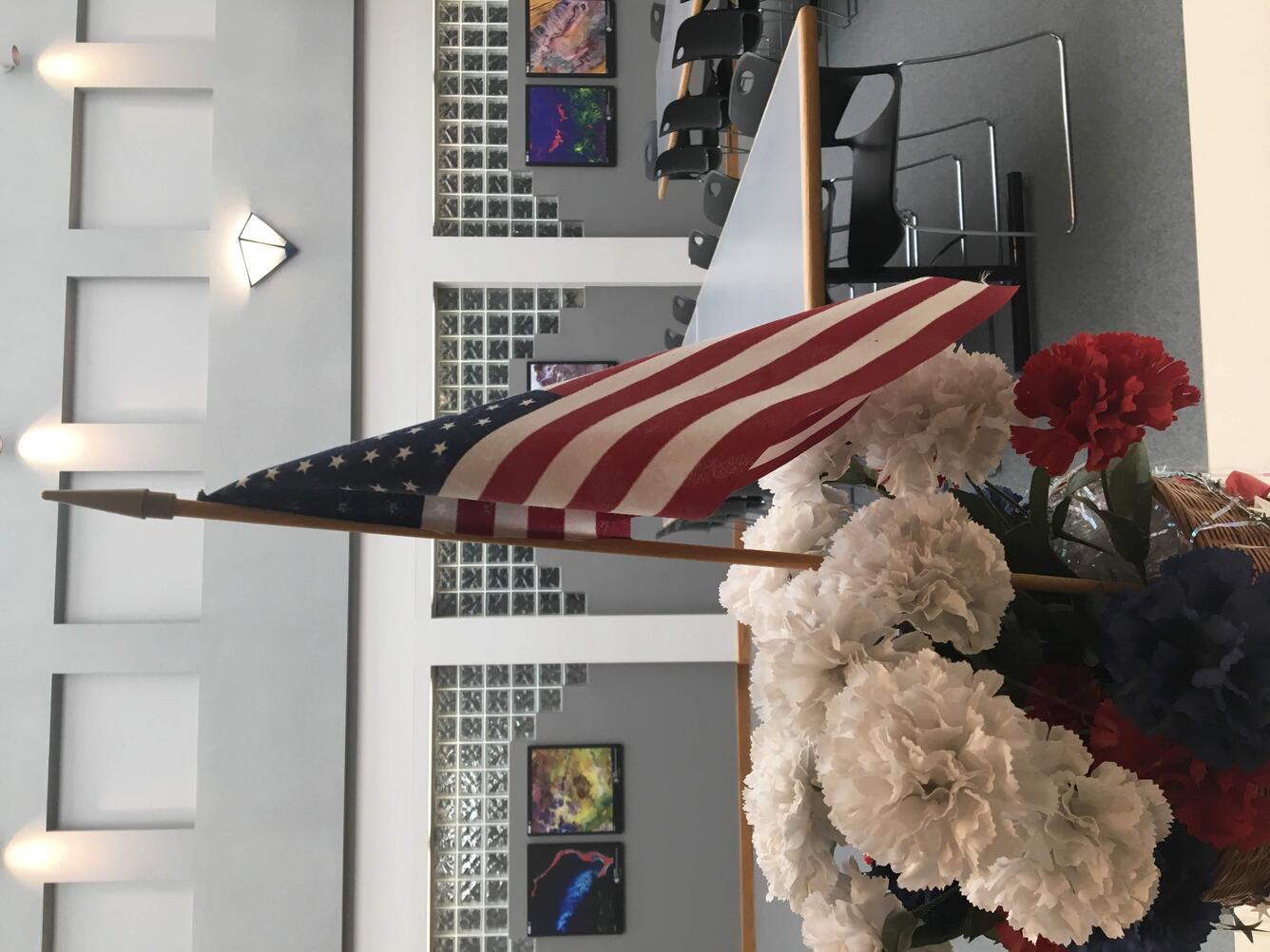 Color photo of flag at USGS EROS Center